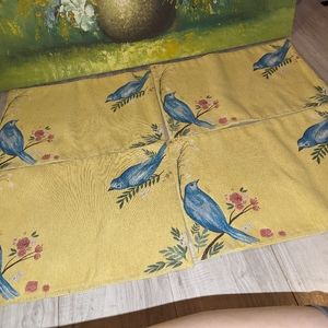 Beautiful four piece bluebird place mats vintage